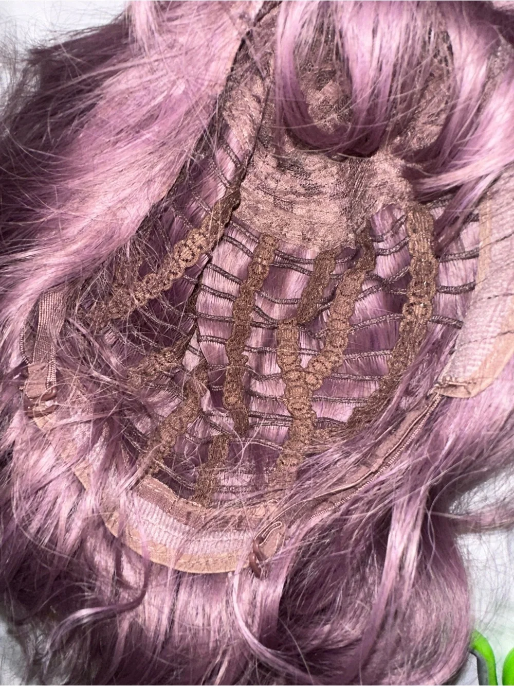 NWOT short wavy wig in a muted dusty mauve/purple shade cosplay